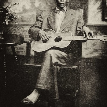Charley Patton – Down the Dirt Road Blues