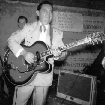 Merle Travis – Dark As A Dungeon